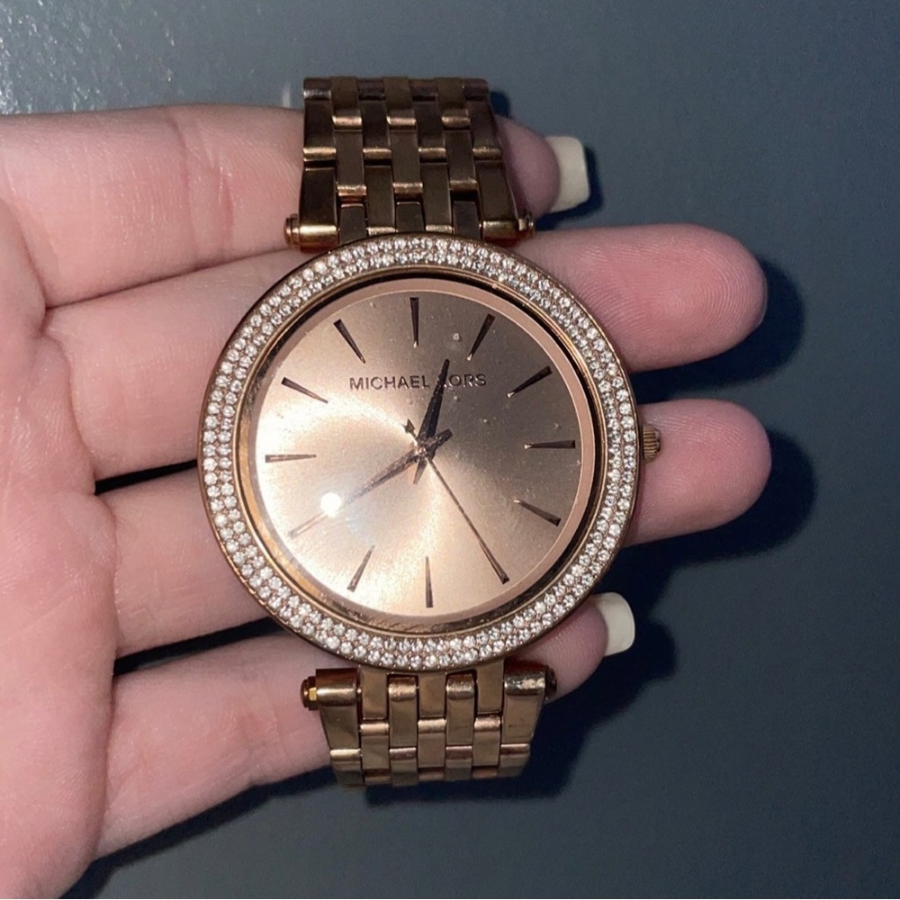 Michael Kors all stainless steel 5 ATM rose gold watch with diamonds.